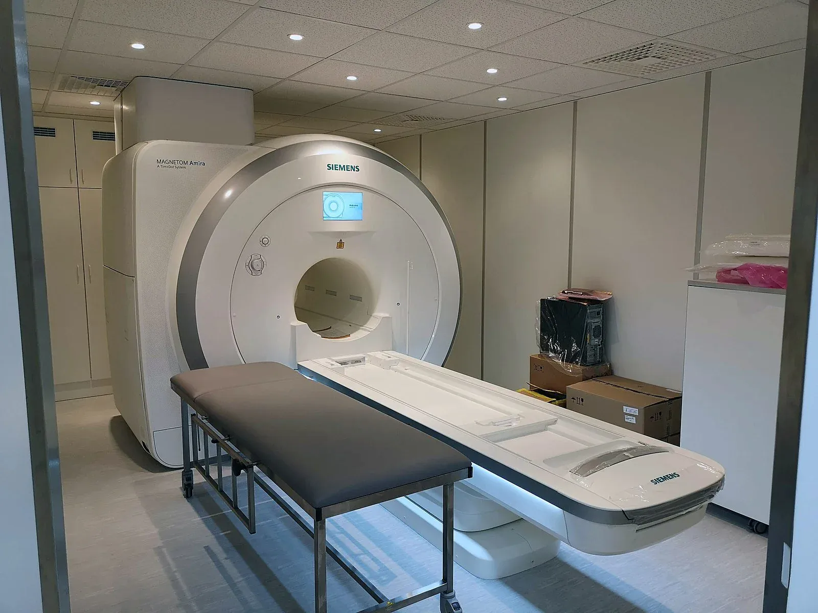 Visual example of an fMRI machine looks like