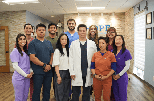 Full HOPE Clinic team group photo in clinic lobby