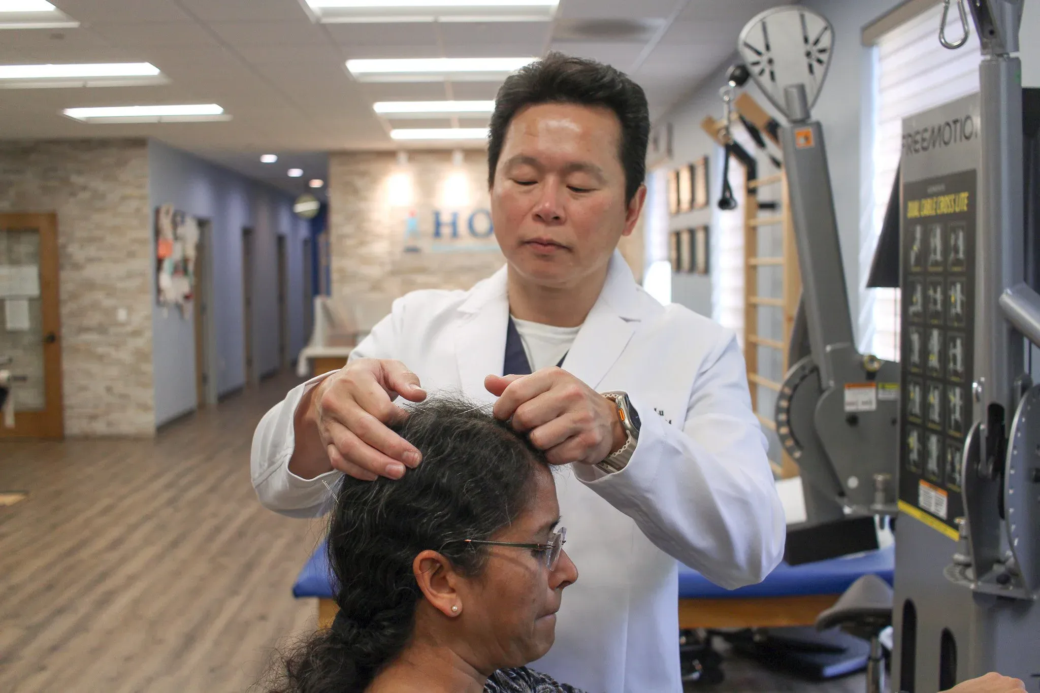 Medical professional examining a patient in a clinic